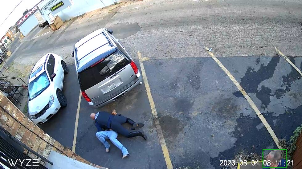 An APD officer chased down a suspect and the suspect tried to reach for his gun.