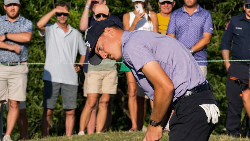 Wyatt Provence lines up his put on 18, an eventual par to secure his spot above the cut line...