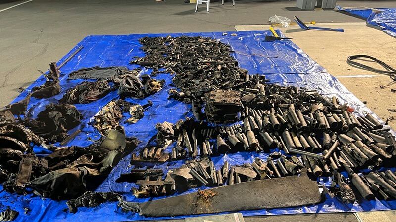 This undated photo, provided by the Las Vegas Police Department shows items found inside a...