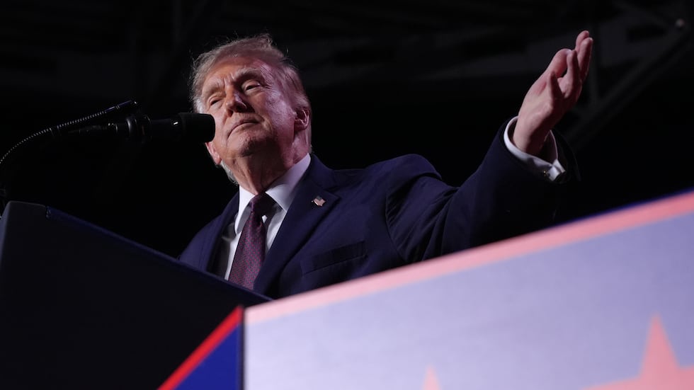 President Donald Trump speaks at a campaign rally at The Mitchell Center in Mobile, Ala.,...