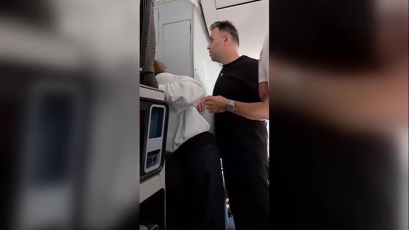 Video inside Flydubai flight shows moment passengers seize control (Source: obtained by CNN)