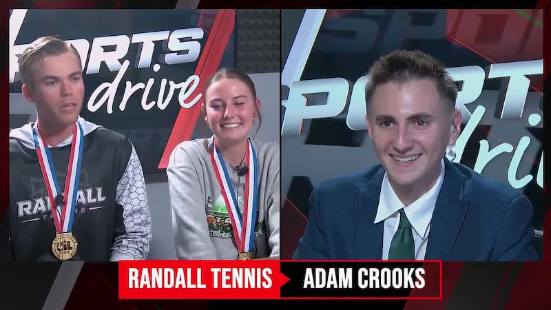 Adam Crooks chats with athletes of the Randall tennis team after their team tennis state title.